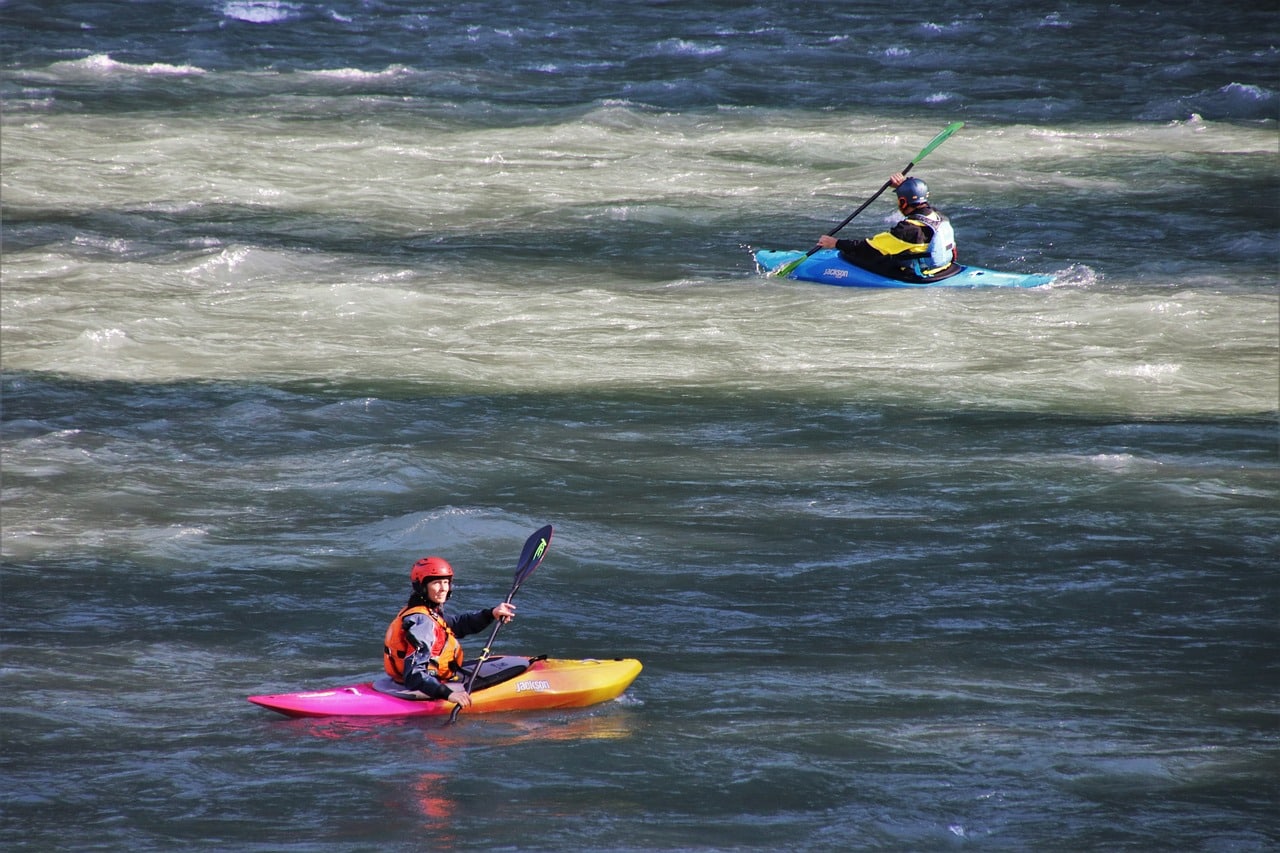 2 people whitewater kayaking
